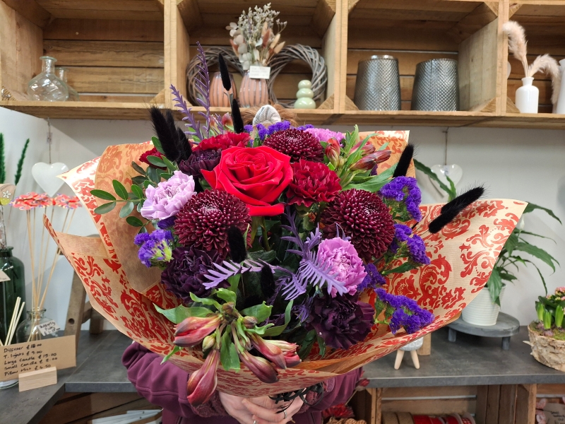 Ruby reds and purple bouquet